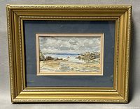 Full view of framed watercolour painting showing the artwork, frame, and matting with minor wear.