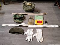 Full lot with caps, pouch, belts, tags, manual, gloves, and clips.