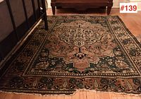 Overall front view showing central medallion and border pattern