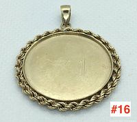 Front view of oval pendant showing smooth face engraved “#1” and twisted rope border