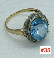 Three-quarter angle view of the ring showing overall design and halo