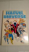 Front cover of The Official Handbook of the Marvel Universe Volume 5 showing Marvel characters.