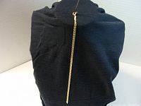 Full view of bracelet displayed on black fabric