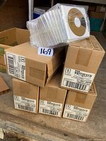 Stack of boxes labeled Kodak Writable CD with quantity information and lot number included.