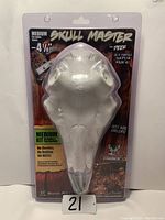 Package front view of Skull Master medium antler base for deer mounts, showing product name and size 4 7/8 inch.