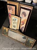 Six vintage framed items including tall slender prints of women, a small frame with three small prints, medium prints, and a large horizontal ornate mirror with side painted images.