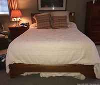 Front view of bed footboard and bedding