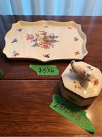 Trinket tray and box displayed on wooden surface with green tape indicating approximate size of tray (7.5x6) and box (2.5x2.5x3) inches.