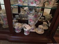 Full set arranged on shelf showing all pieces