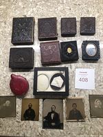 Eight ornate cases, red teardrop case, black display frame, loose plates and MaxSold lot card