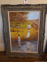 Full frontal view of painting and frame mounted on wall