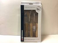Front image of Swissmar 3-piece cheese knife set in original box showing knives with wooden handles.