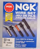 Front packaging of NGK ignition wire set showing brand, part number 54116 RC-EUX022, and product details highlighting OEM fit and design.