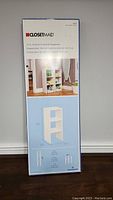 Front view of the packaged ClosetMaid 31" vertical stackable organizer showing product image and dimensions.