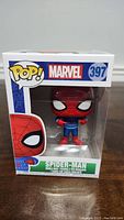 Front view of the Spider-Man Ugly Christmas Sweater Funko Pop figure in original box