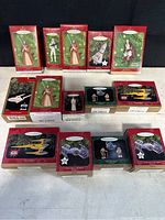 Overview of all boxed Hallmark Keepsake Star Wars and Star Trek ornaments arranged on a table