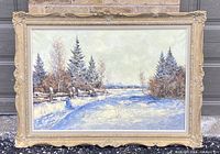 Full view of the large framed winter landscape oil painting showing snowy scene, trees, and wooden fence.