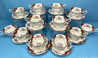 Full set of 12 matching vintage Royal Albert Canterbury teacups and saucers arranged in rows