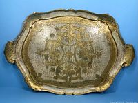 Full view of vintage Italian Florentine tray showing overall shape, design, and wear.