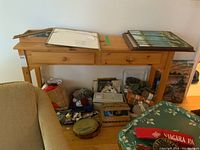 Another front view focusing on drawers and natural wood grain.