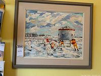 Full frontal view of framed oil painting depicting hockey game on ice