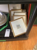 Seven original miniature pencil drawings on paper bag by ME Crawford, six framed in gold frames, one matted without frame.