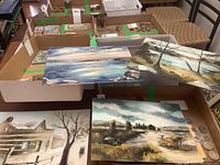 Group of six unframed landscape paintings by ME Crawford laid out, showing a variety of natural scenes including water, trees, and skies in different lighting conditions.