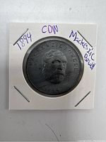 Front side of the medal showing raised profile portrait of Mackenzie Bowell with text 'MACKENZIE BOWELL' and date '1894'.