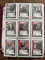 Photo showing a page of 9 Star Trek trading cards featuring characters like B'Elanna Torres, Ensign Ro, and Klingon characters.