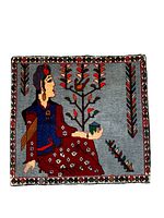 Floor photo of square rug showing detailed portrait of an indigenous woman in traditional dress with floral elements and decorative border.