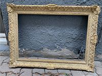 Full view of gilt gesso frame with floral ornate carvings and 24x16 inch interior.