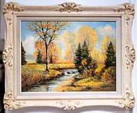 Front view of framed oil on board painting with a riverside autumn landscape and bright fall colors, signed L. Wechlin in the lower right corner.
