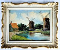 Framed oil on board painting showing Dutch style landscape with 2 windmills, pond, and a house.