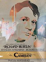 Close-up image showing the illustrated portrait of Richard Burton and detailed text credits for the play Camelot.