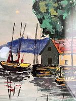 Close-up of the boating and wharf scene showing colorful boats and buildings with reflection in water.