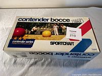 Top and front side view of original Contender Bocce ball set box with colorful graphic, Sportscraft brand and Made in Italy stamp.