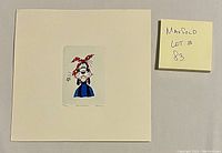 Full view of the miniature etching mounted on a cream mat board with a sticky note beside it showing lot number.