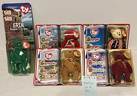 Front view of all five sealed TY Beanie Babies from McDonald's International Bears II collection showing Erin, Osito, Spangle, Germania, and Millennium bears in original packaging.