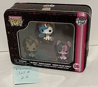 Front view of the sealed tin packaging showing the three My Little Pony Pocket Pop! figures inside.
