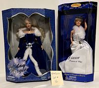 Two dolls in original packaging: 2001 Holiday Magic Doll and Diana Princess of Wales Doll