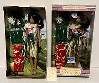 Both Tahitian Noni Princess dolls side by side, one boxed, one loose with accessories visible