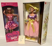 Front view of the two boxed Barbie dolls: 1997 Valentine Barbie and 1995 Spring Blossom Barbie, showing packaging and dolls