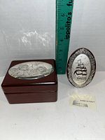 Two trinket boxes side by side with measuring ruler showing size and 'Made in Italy' tag