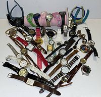 Lot of 29 assorted watches including analog, quartz, and fitness bands in various styles and colors.