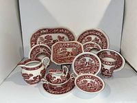 Full overview of the set showing plates, platters, cups, creamer, and pitcher arranged together on a white background.