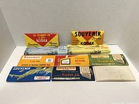 Kodak souvenir slide boxes from Italy, Florence, Rome, and other locations arranged in rows.