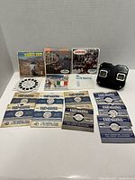 Full lot showing Sawyer's View-Master viewer and multiple travel-themed reels including Tower of London and Sardinia.