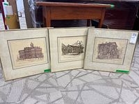 Three framed prints of Toronto historic buildings by Dorothy McClure shown grouped together on floor, frames appear dirty and aged.