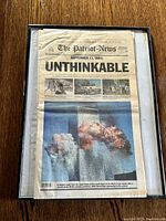 Framed first newspaper from The Patriot-News with headline UNTHINKABLE and image of World Trade Center hit