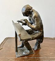 Side profile of seated pianist at keyboard